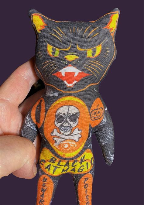 The Interplay between Black Cats, Voodoo Dolls, and Mystical Powers